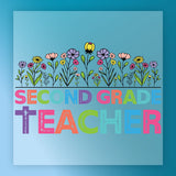 a colorful graphic design with the text "SECOND GRADE TEACHER" prominently displayed. The design includes various flowers and plants, creating a vibrant and playful visual representation of a second-grade teacher.