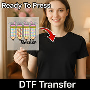 A woman holding a sign with a pencil graphic and the word "Teacher" written on it, with a red arrow pointing to the pencil graphic.