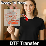 A woman is holding up a sign with a basketball graphic and the text "Out there Ballin'", with a red arrow pointing to the sign.