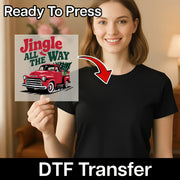 A woman in a black shirt holds InkMerge’s Jingle All The Way Vintage Truck Design DTF transfer, featuring a red truck, Christmas tree, and festive text. An arrow and “Ready To Press: DTF Transfer” highlight it for custom apparel.