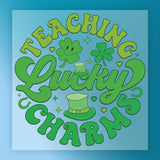 a circular arrangement of text and symbols related to luck and charms, including the words "Teaching Lucky Charms" and various symbols such as a clover, a horseshoe, and a four-leaf clover.