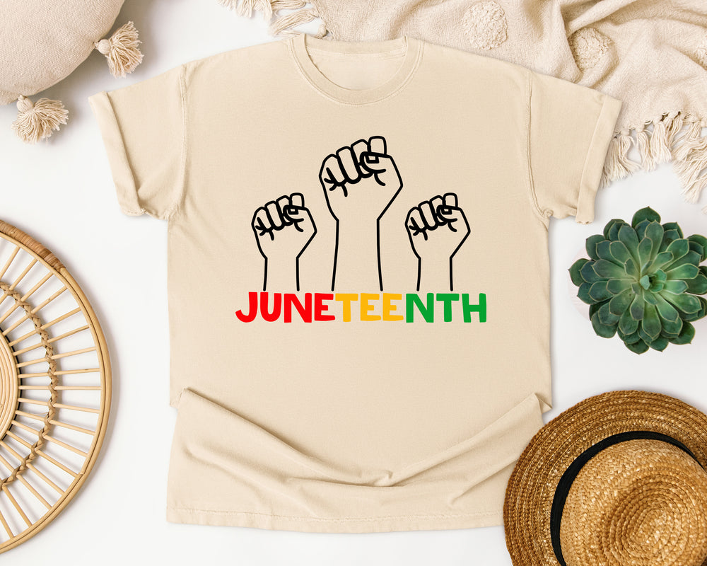 Juneteenth Three Fists graphic tee in Ivory Comfort Colors 1717