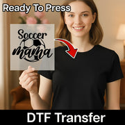 A smiling woman holding a sign with the text "Soccer mama" on it, with a red arrow pointing to the sign.