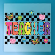 The image is a colorful and playful graphic design featuring the word "TEACHER" surrounded by various whimsical elements such as butterflies, flowers, and apples, all set against a checkered background.