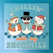 The InkMerge Chillin' With My Snowmies Design features three cheerful snowmen in winter outfits, with playful text—ideal for custom apparel using DTF transfers and a heat press!.