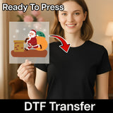A smiling woman in a black shirt holds the InkMerge Cheerful Santa Claus Design DTF transfer—featuring Santa with chimney and gift sack—for custom apparel or ugly sweater parties. Text reads "Ready To Press" and "DTF Transfer," with a red arrow pointing to the design.