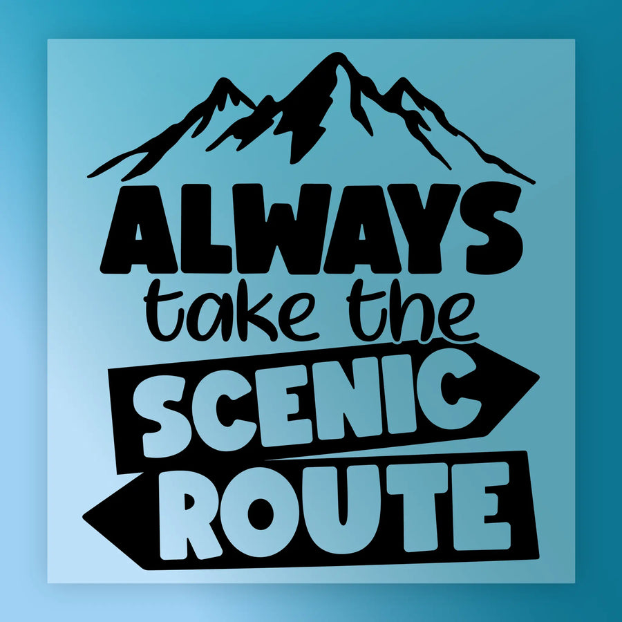 The Always Take the Scenic Route DTF transfer by InkMerge features a blue square with a black mountain above “ALWAYS take the SCENIC ROUTE” in bold fonts, with SCENIC ROUTE inside arrows—precut DTF film ready for your heat press.