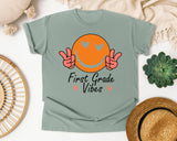 First Grade Vibes Smiley graphic tee in Bay