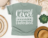 3rd Grade Level Unlocked White graphic tee in Bay