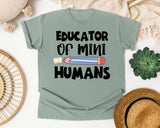 Educator Of Mini Humans graphic tee in Bay