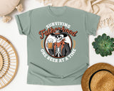 Surviving Fatherhood One Beer At A Time Brown graphic tee in Bay