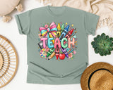 Teach Crayons graphic tee in Bay