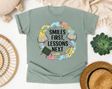 Smiles First Lessons Next graphic tee in Bay