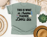 This Is What An Awesome Teacher Looks Like graphic tee in Bay