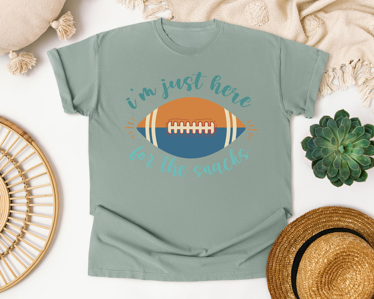 Im Just Here For The Snacks Football graphic tee in Bay