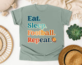 Eat Sleep Football Repeat Stacked graphic tee in Bay