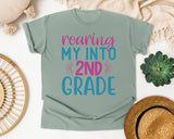 Roaring My Into 2nd Grade graphic tee in Bay