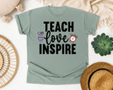 Teach Love Inspire Coffee graphic tee in Bay
