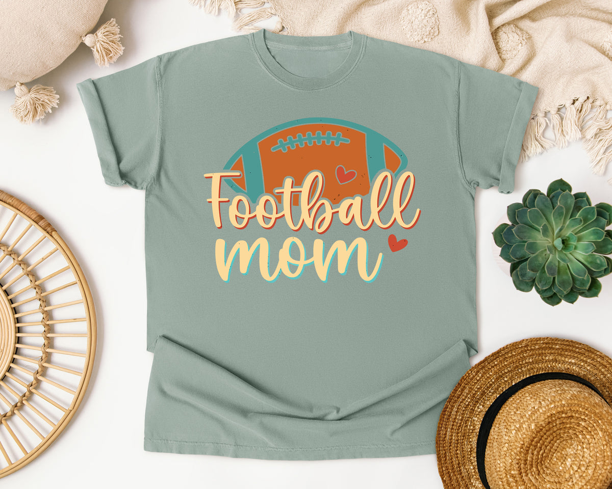 Football Mom Orange Ball graphic tee in Bay