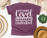 4th Grade Level Unlocked White graphic tee in Berry