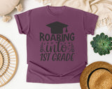 Roaring Into 1st Grade White graphic tee in Berry