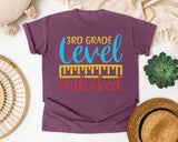 3rd Grade Level Unlocked Teal graphic tee in Berry