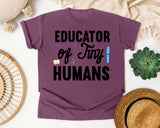Educator Of Tiny Humans Pen graphic tee in Berry