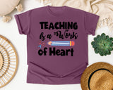 Teaching Is A Work Of Heart Pencil graphic tee in Berry