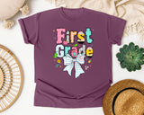 First Grade Paper Bow graphic tee in Berry