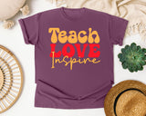 Teach Love Inspire Retro graphic tee in Berry