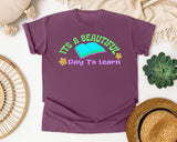 It's A Beautiful Day To Learn graphic tee in Berry
