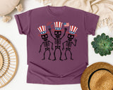 Three Dancing Patriotic Skeletons graphic tee in Berry