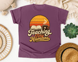 Teaching Tiny Humans Retro Sunset graphic tee in Berry