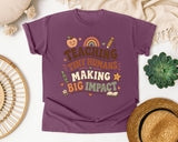 Teaching Tiny Humans Making Big Impact graphic tee in Berry