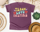 Teach Love Inspire Strawberry graphic tee in Berry
