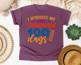I Sparkled My Way Through 100 Days White 2 3 graphic tee in Berry