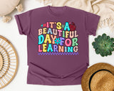 Its A Beautiful Day For Learning graphic tee in Berry