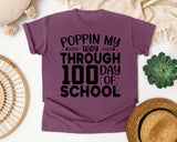 Poppin My Way Through 100 Days Of School White graphic tee in Berry