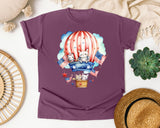 Bunnies In Hot Air Balloon graphic tee in Berry