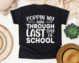 Poppin My Way Through Last Day Of School White 2 graphic tee in Black