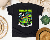 Roaring Into Kindergarten Dinosaur Graphic Tee graphic tee in Black