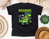 Roaring Into Kindergarten Dinosaur Bright Graphic Tee graphic tee in Black