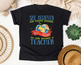 She Believed She Could Change The World So She Became A Teacher graphic tee in Black