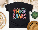 Third Grade Smiley Graphic Tee graphic tee in Black