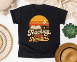 Teaching Tiny Humans Retro Sunset graphic tee in Black