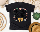 Kindergarten Script Bow Graphic Tee graphic tee in Black