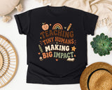 Teaching Tiny Humans Making Big Impact graphic tee in Black