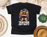 Teacher Off Duty Messy Bun graphic tee in Black