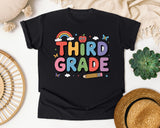 Third Grade Rainbow Clouds Graphic Tee graphic tee in Black