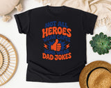Not All Heroes Wear Capes Some Wear Dad Jokes Orange graphic tee in Black
